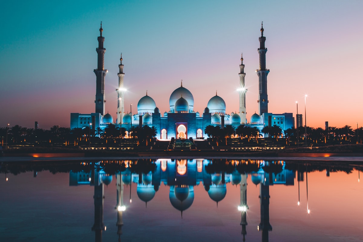 Study in UAE from Pakistan students with textbooks against the Dubai skyline